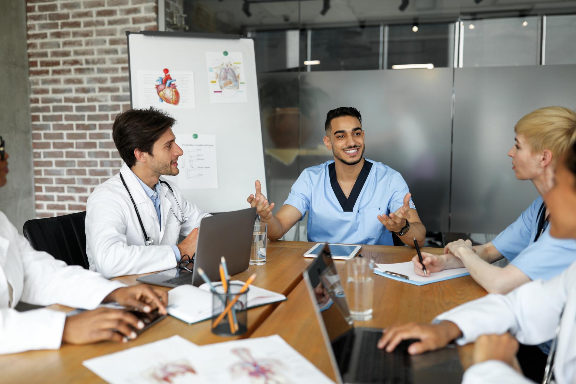 Dr. Jovanovic consulting with referring professionals